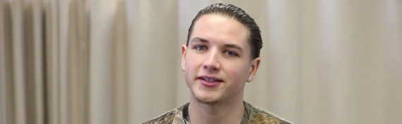 ankle-injury-testimonial-thumbnail young man with earring smiling at camera