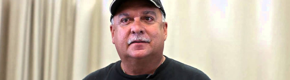 back-injury-physical-therapy-featured-img man in a ball cap