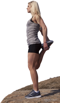 woman-lifting-up-her-leg-to-stretch-in-the-outdoors